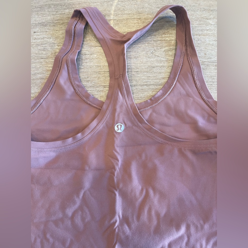 Lululemon tank, size 6. Spiced chai. Smoke free home.